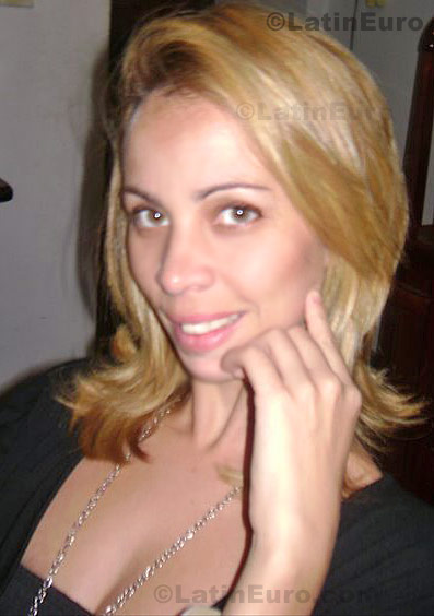 Date this happy Brazil girl Teresa from Resende B610